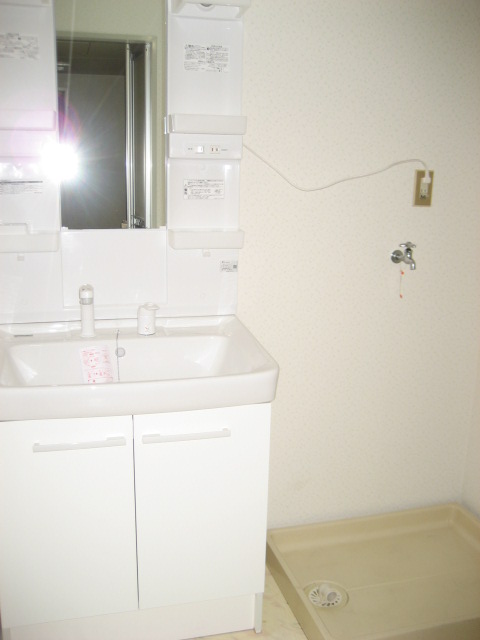 Washroom. Shampoo dresser new replaced.