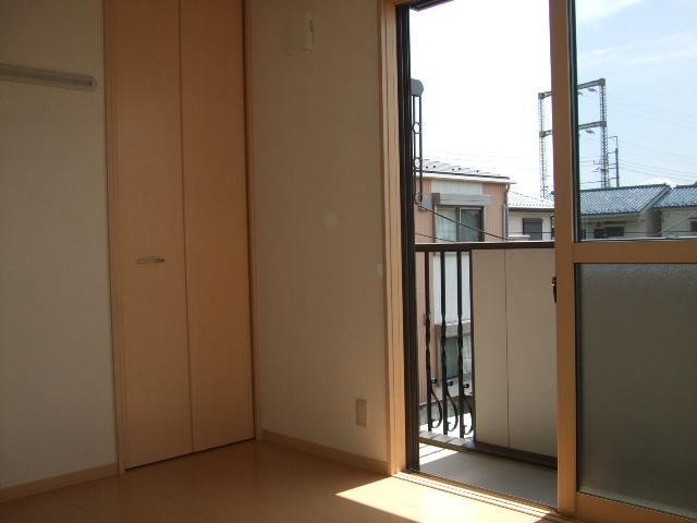 Living and room. Bright Western-style facing the balcony