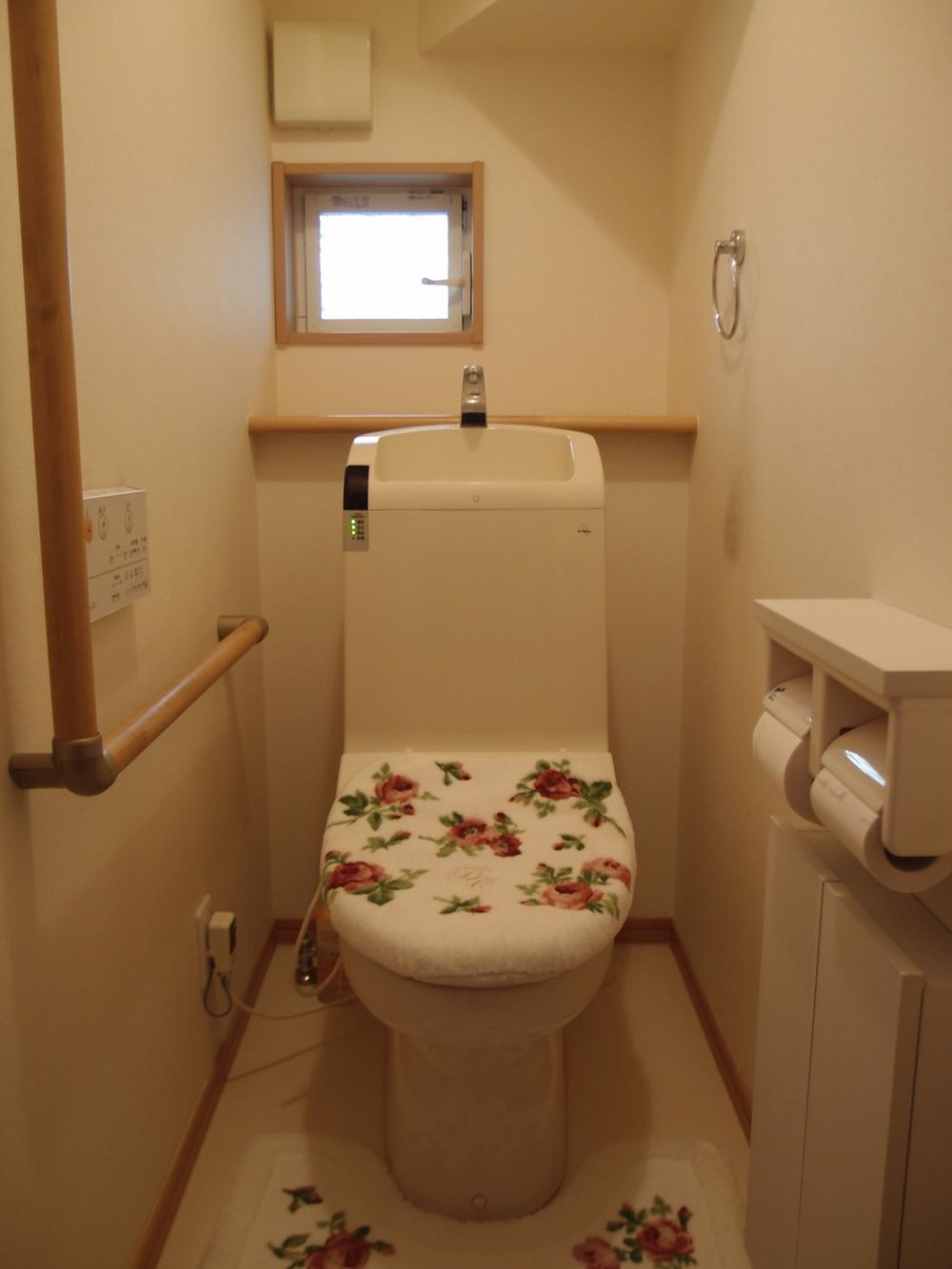 Toilet. First floor toilet facilities (warm water cleaning toilet seat)