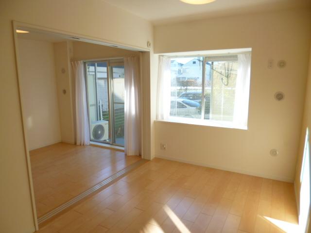 Living. The first floor but is a bright property has a private garden