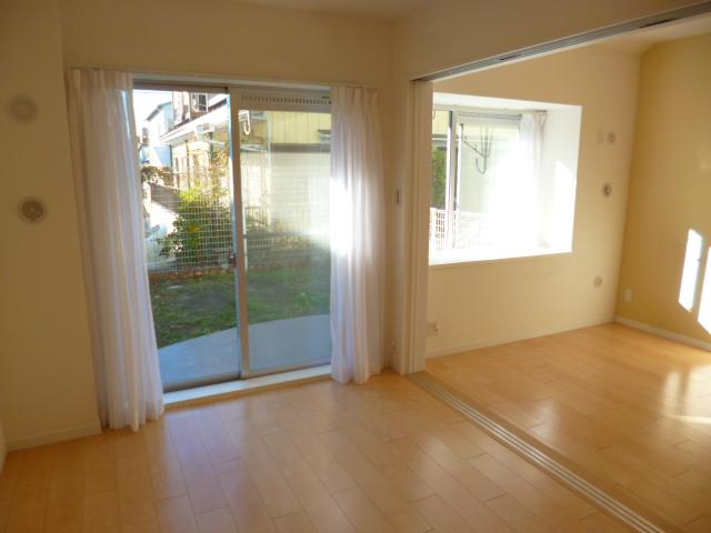 Living. The first floor but is a bright property has a private garden