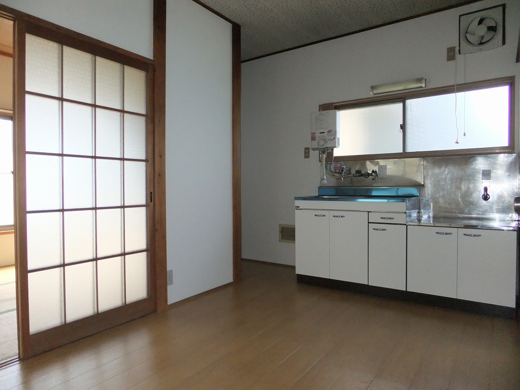 Living and room. Spacious kitchen around