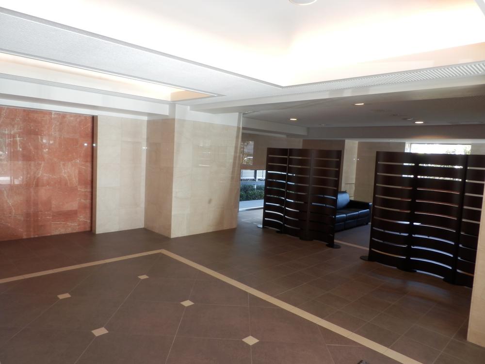 lobby. Common areas. It is a spacious lobby.