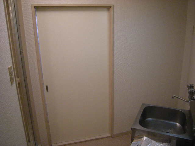 Other. The door to the room and the kitchen