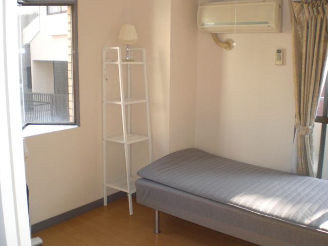 Living and room. Glad bet! Since the corner room is large window!