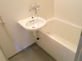 Bath. Wash basin is sharing a room with a bath. 