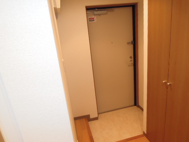 Entrance. With shoe box