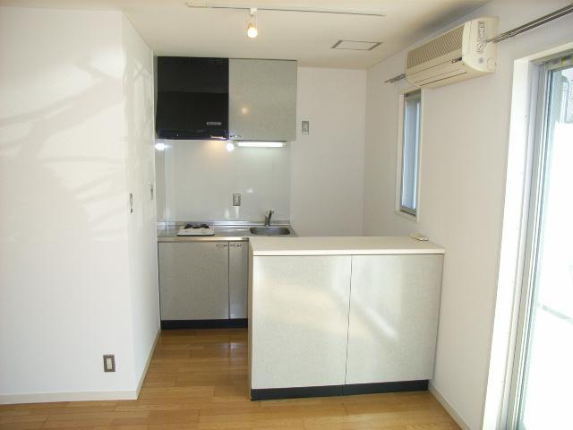 Kitchen. Movable counter (Storage room) with a Gasukitchin