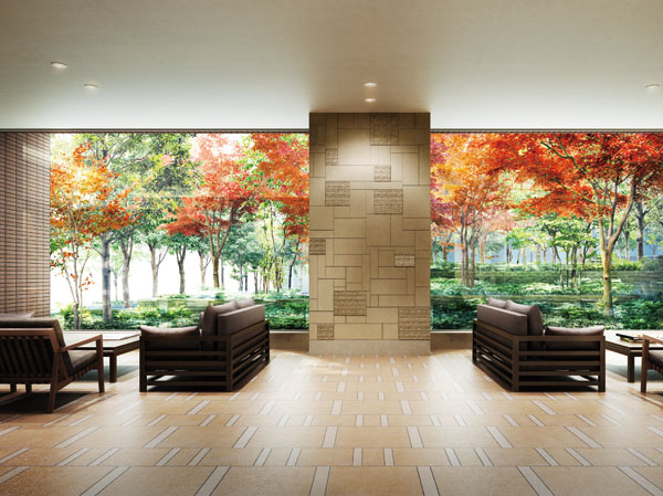 Shared facilities.  [Lounge reminiscent of a hotel lobby] Graceful space for a courtyard that spread through the glass and the scenic backdrop. It is yet stylish natural color of the material and grade sense of drift design of wood grain of limestone-based, Create a cozy space. (Rendering CG)