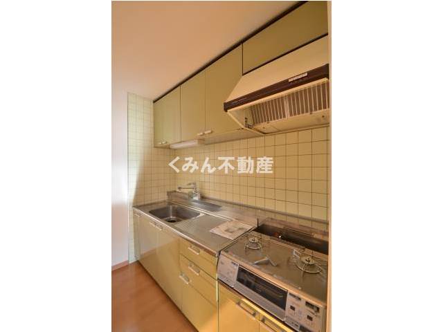 Kitchen. It is a photograph of the same floor plan the third floor of the room,