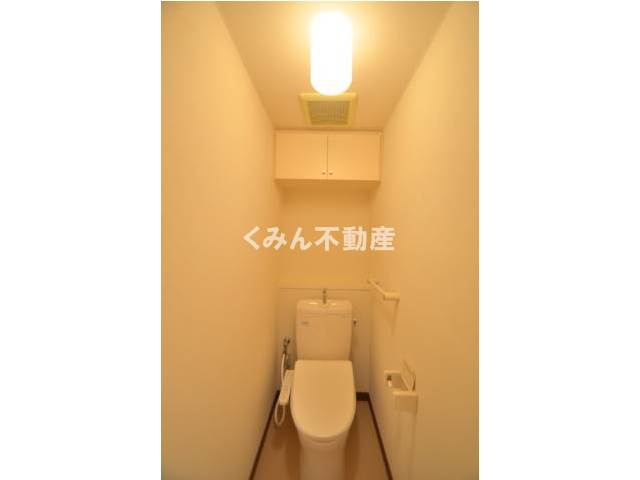 Toilet. It is a photograph of the same floor plan the third floor of the room,