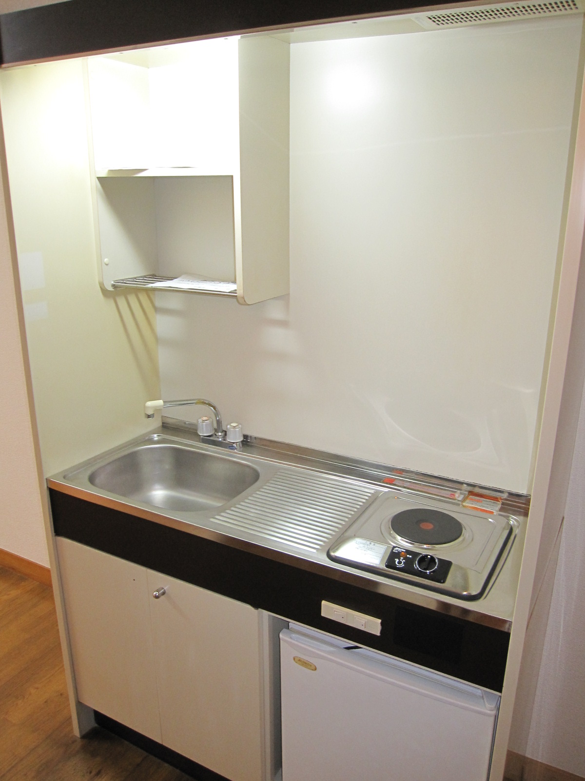 Kitchen. With a mini fridge in the mini-kitchen