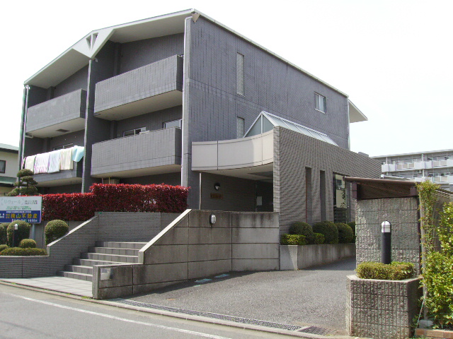 Building appearance. Exterior tiled apartment! 