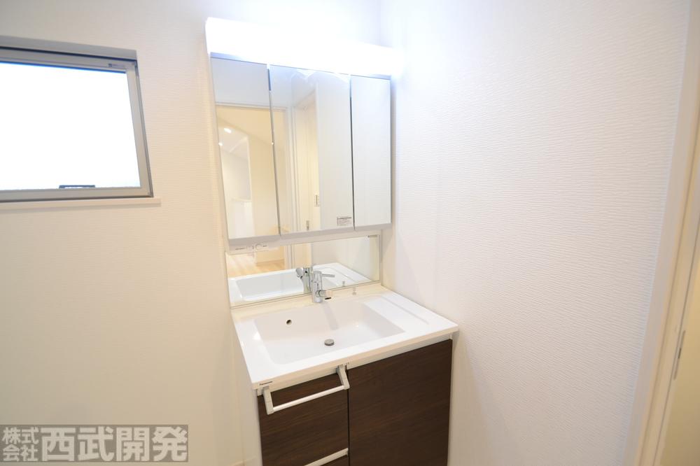 Wash basin, toilet. D Building