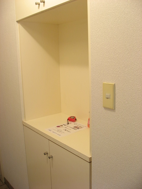 Entrance. The cabinet on the footwear put try to put the flowers and photos ・  ・  ・ ?