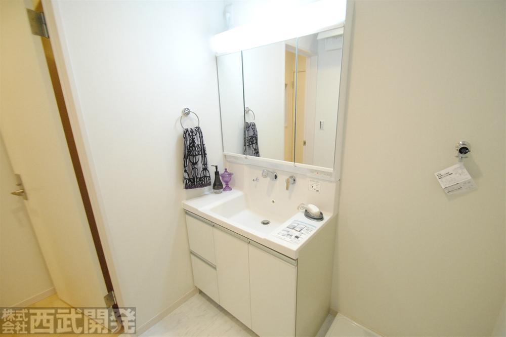 Wash basin, toilet. A Building