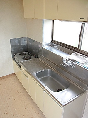 Kitchen. Two-burner gas stove installed already kitchen