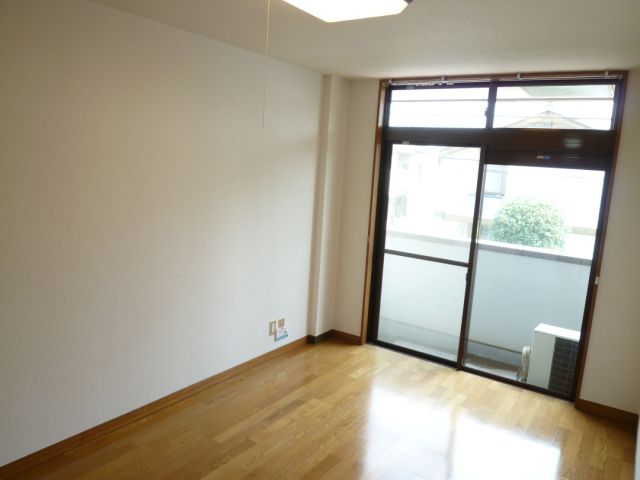 Living and room. This room of flooring with large windows