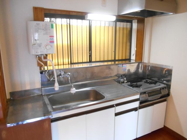 Kitchen. Two-burner gas stove can be installed, Pat ventilation and comes with a window