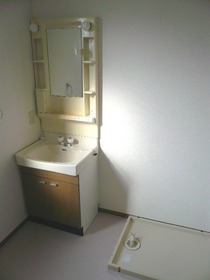 Washroom. The photograph is the same type reference photograph