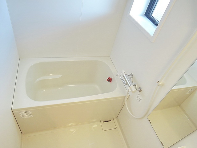 Bath. Small window with ・ Bathroom