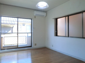 Living and room.  [Separate reference photograph] East-facing room