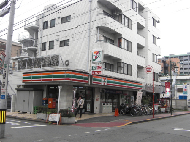 Convenience store. Seven-Eleven Kokuritsukita 2-chome up (convenience store) 416m