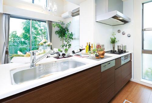 Kitchen. Bright and refreshing face-to-face kitchen of natural light, Dish washing and drying machines and water purifier built-in-type hand shower faucet, etc., Advanced equipment is aligned to decorate the living comfort of. (Sale Models House)