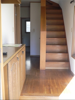 Entrance. Cupboard & stairs