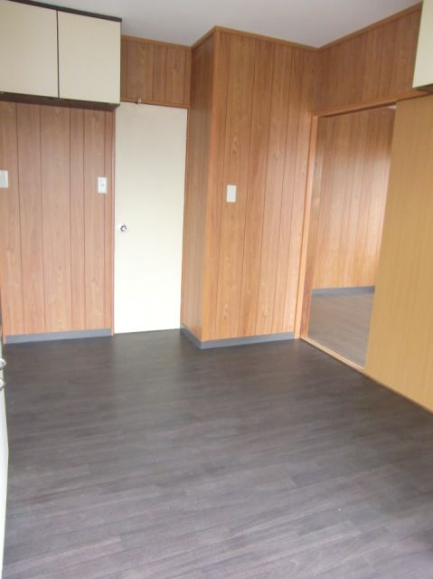 Living and room. It is black-based flooring