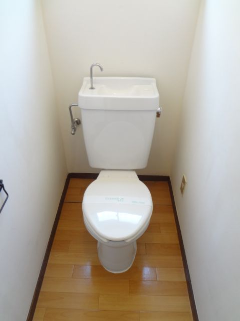 Toilet. Toilet space with a window