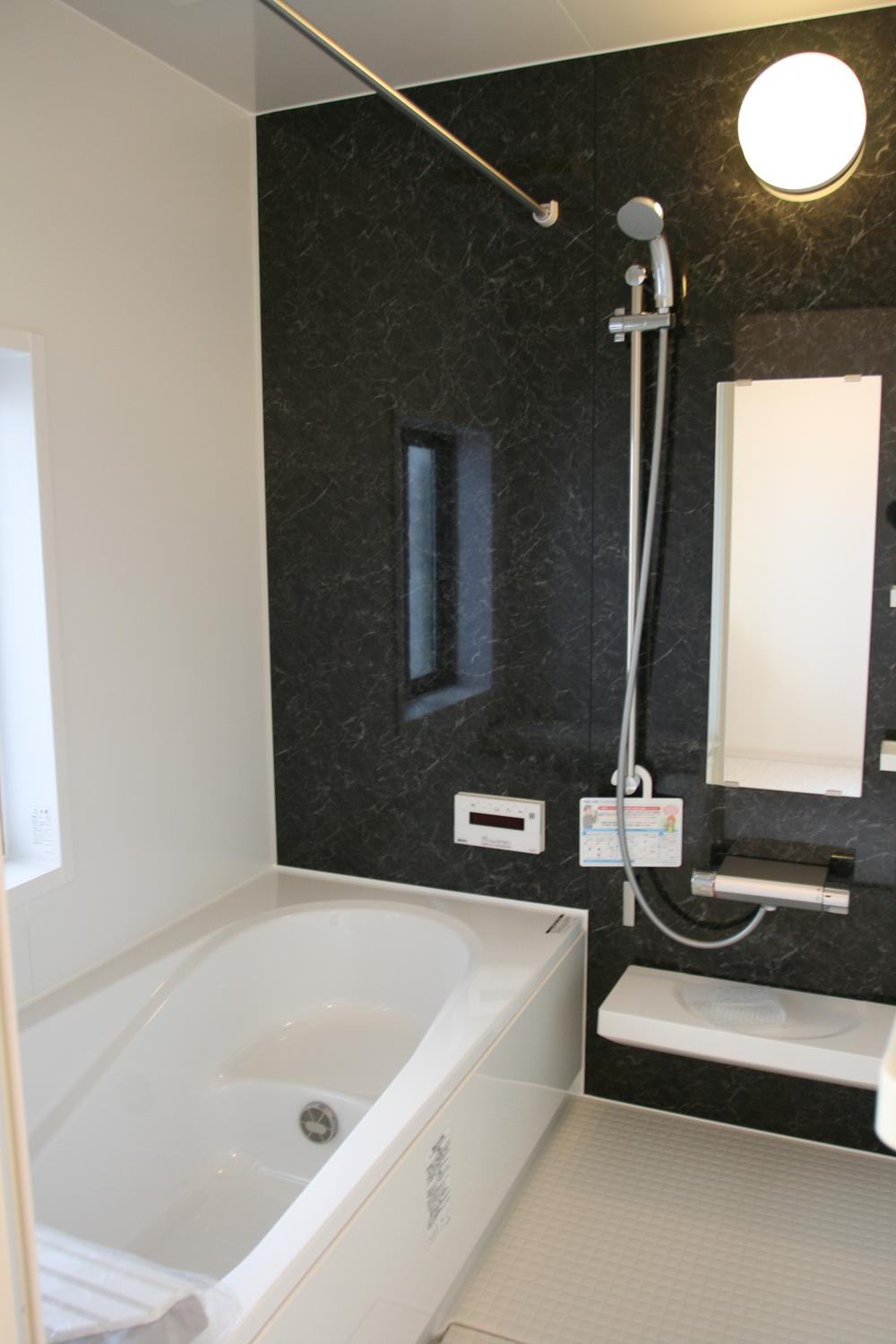 Bathroom. ● There is a window bright bathroom