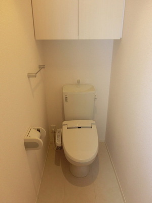 Toilet. Toilet is equipped with Washlet