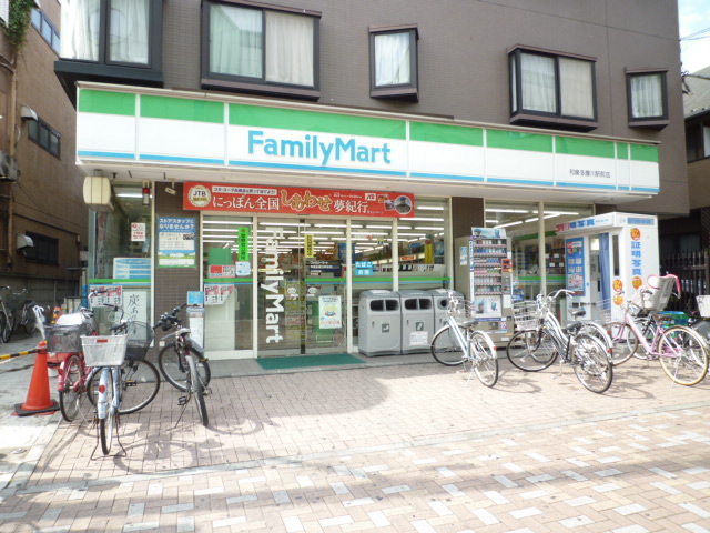 Convenience store. FamilyMart Izumi Tamagawa Station store up (convenience store) 594m