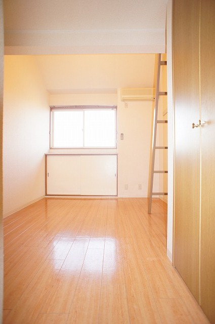 Living and room. Because the loft is high ceiling