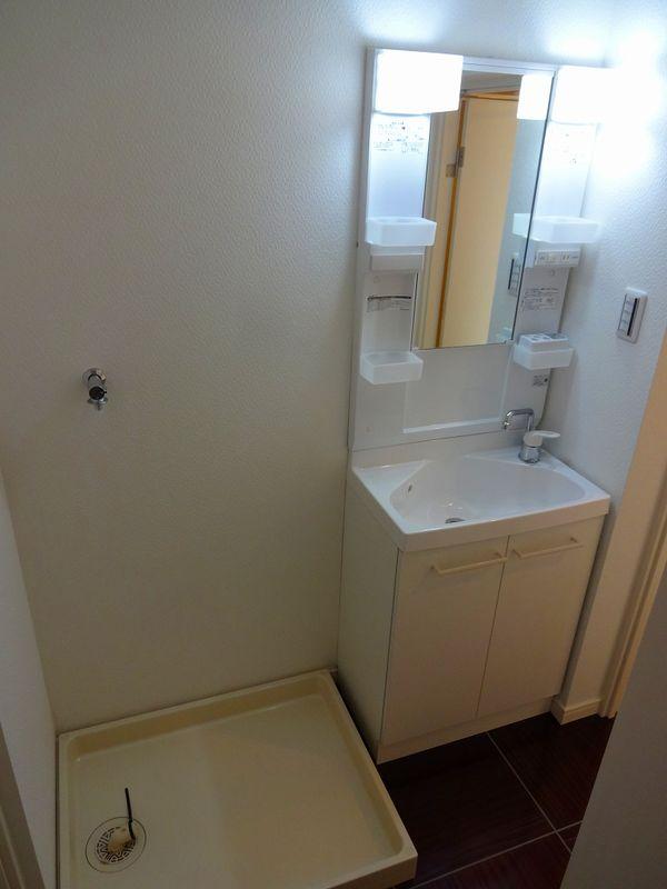 Wash basin, toilet. Bathroom vanity