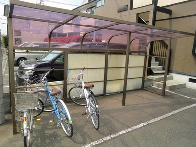 Other common areas. There are bicycle parking lot with a roof