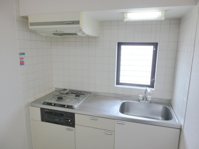 Kitchen. 2 lot gas stoves of the system kitchen ・ Ventilation is easy because there is close window