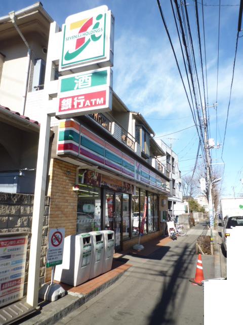 Convenience store. Seven-Eleven Komae Nakaizumi Sanchome store up (convenience store) 371m