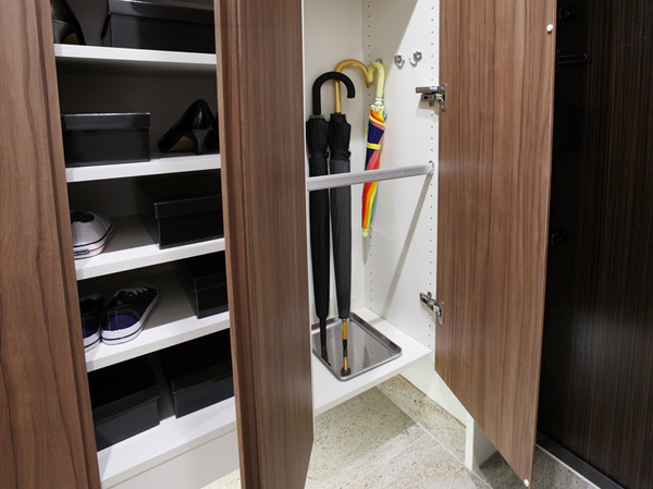 Other.  [Entrance footwear put stroller storage] By removing the bottom plate of the umbrella stand part of the footwear box, Such as strollers and golf bag you will find a convenient storage space can be stored.