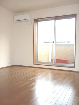 Living and room. It is a photograph of a separate room of the same properties.