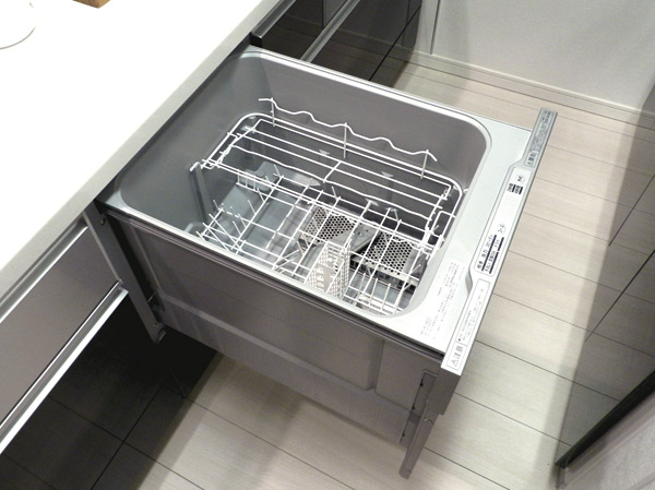 Kitchen.  [Dish washing and drying machine] A dish washing and drying machine that will significantly eliminating the hassle of housework has been standard equipment.