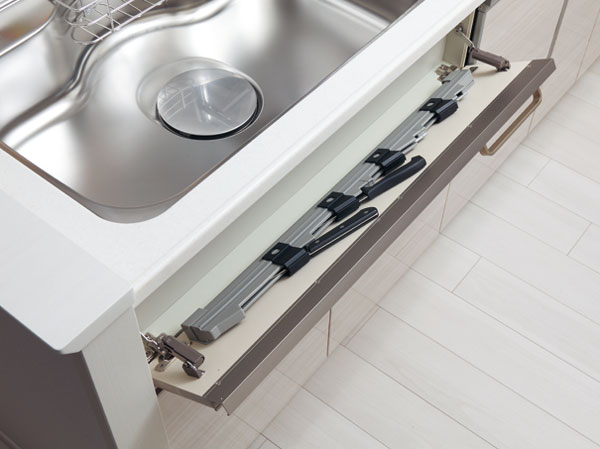 Kitchen.  [Sink before kitchen knife feed] It can be stored four kitchen knife before sink was a dead space. It is also hard to reach safe design for children.