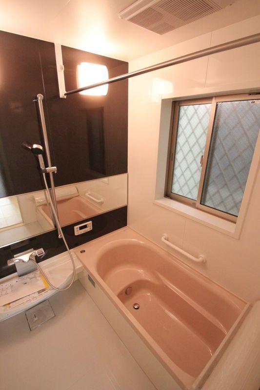 Bathroom. Spacious unit bath with a window