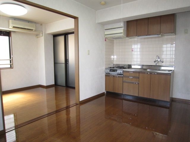 Living and room. Window is bright with a lot of.