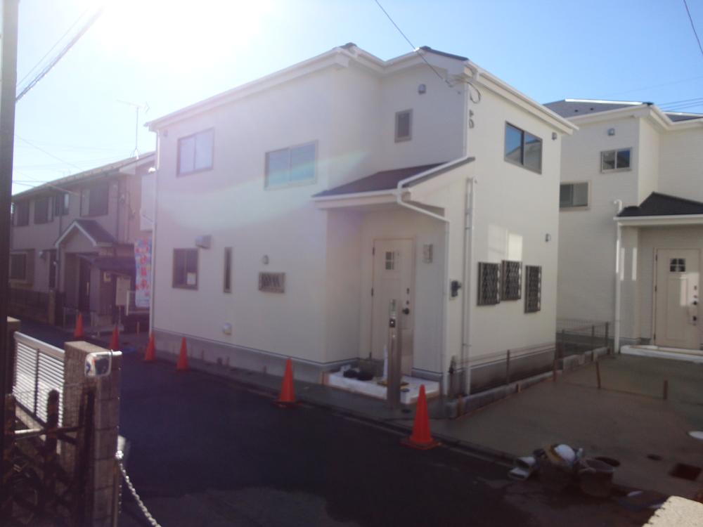 Local photos, including front road. Left 1 Building Right Building 2