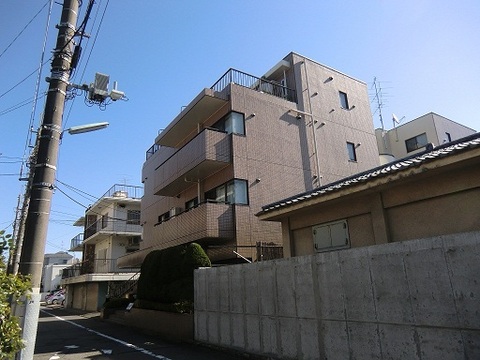 Building appearance. It is a quiet residential area.