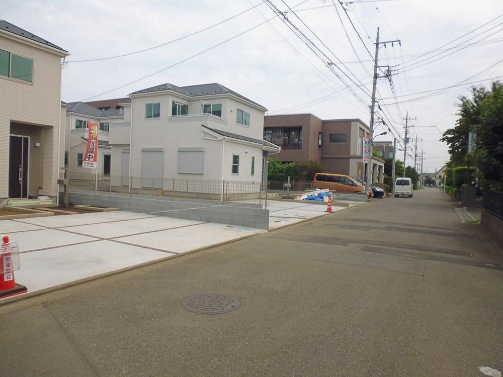 Local photos, including front road. 2 Phase 1 Building