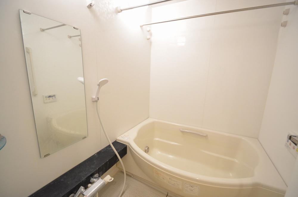 Bathroom. Please take your tired of the day stretched out his leg in a large bath