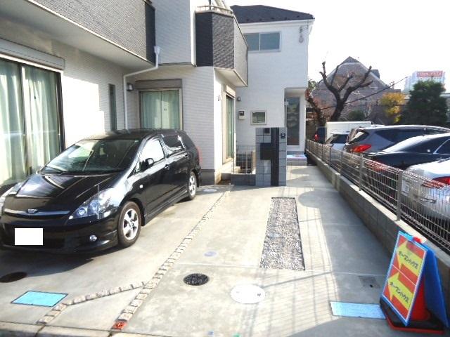 Parking lot. Car space + bicycle space